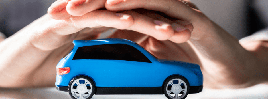 Hands hovering a toy car