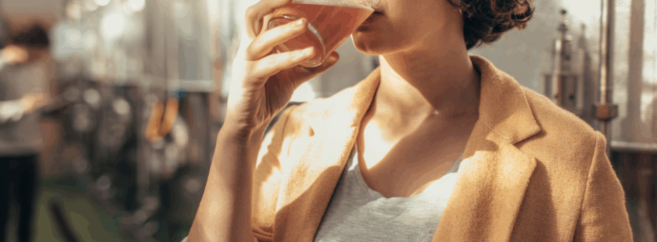 woman drinking some craft beer
